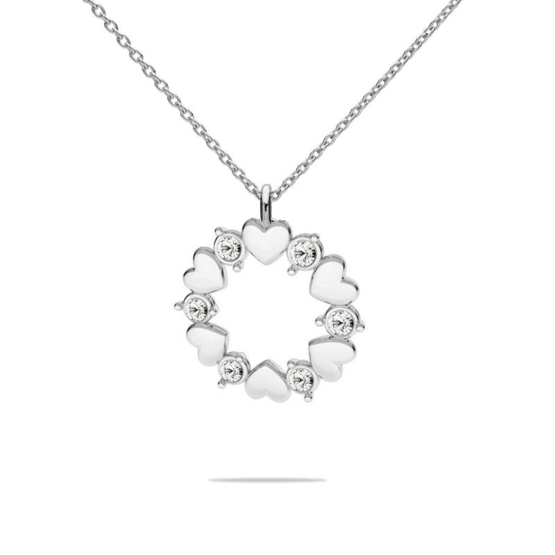 Crystal Harmony Necklace with circular pendant and heart-shaped crystals in sterling silver by Magpie Gems.