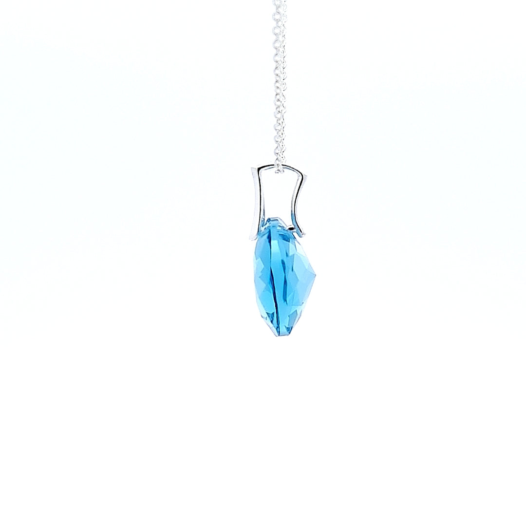 Side profile of the Sterling Silver Birthstone Necklace showcasing intricate details in March Aquamarine