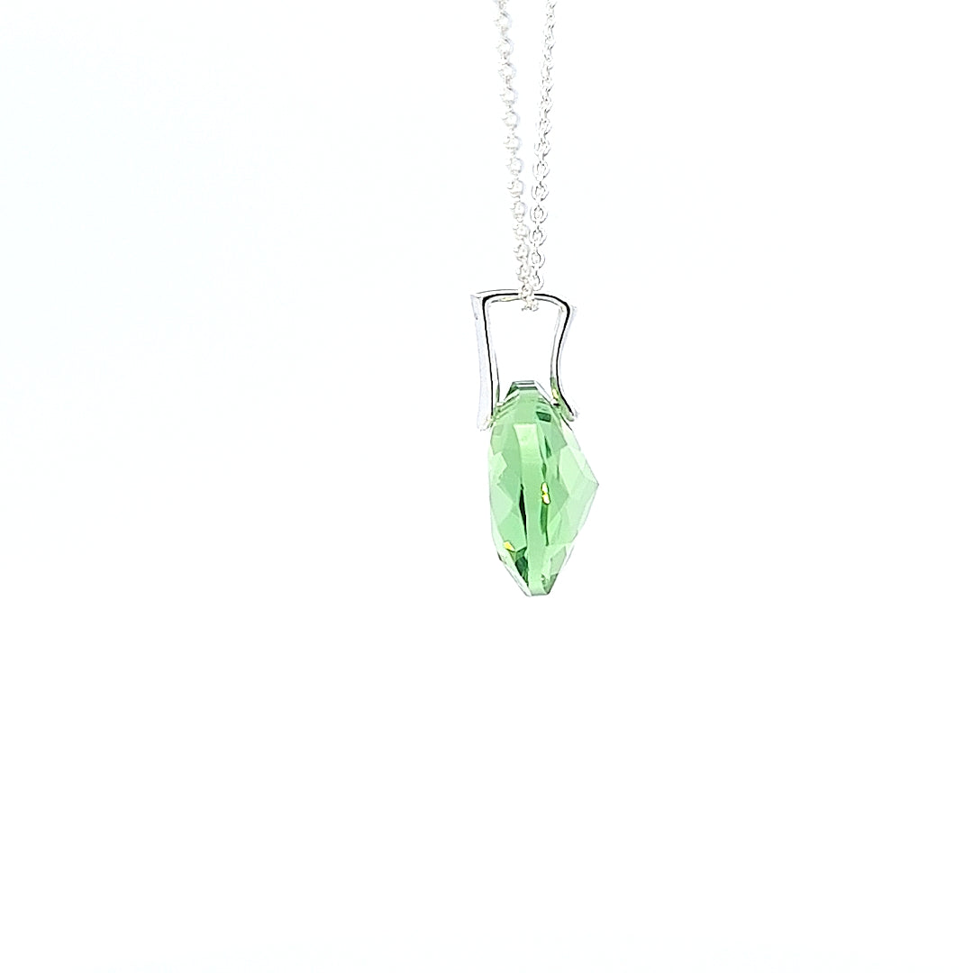 Side profile of the Sterling Silver Birthstone Necklace showcasing intricate details. in August Peridot Lime Green