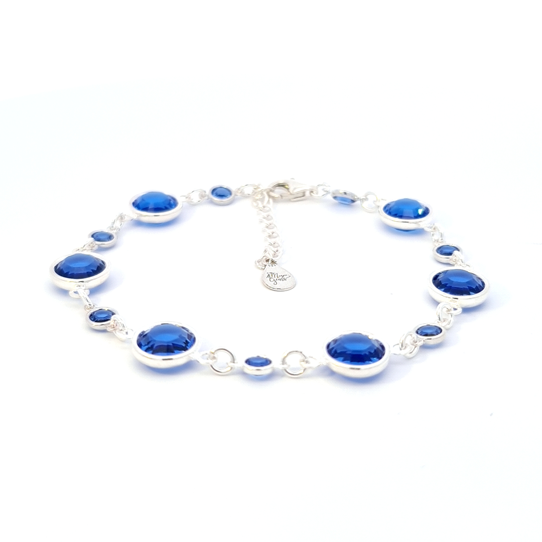 September birthstone sterling silver bracelet, with sapphire crystals that resonate with wisdom and dignity, each link a testament to Irish craftsmanship.