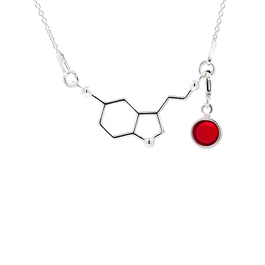 Be Happy is a serotonin formula molecule pendant necklace in sterling silver with a july birthstone made in Ireland. 