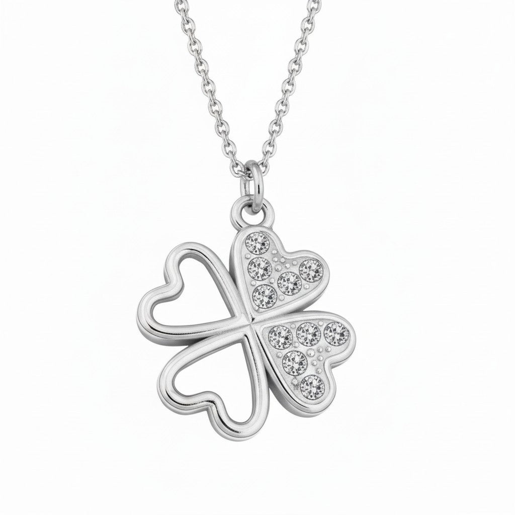Sterling silver four-leaf clover necklace with heart-shaped petals and Austrian crystals, handmade in Ireland by Magpie Gems in Ireland.