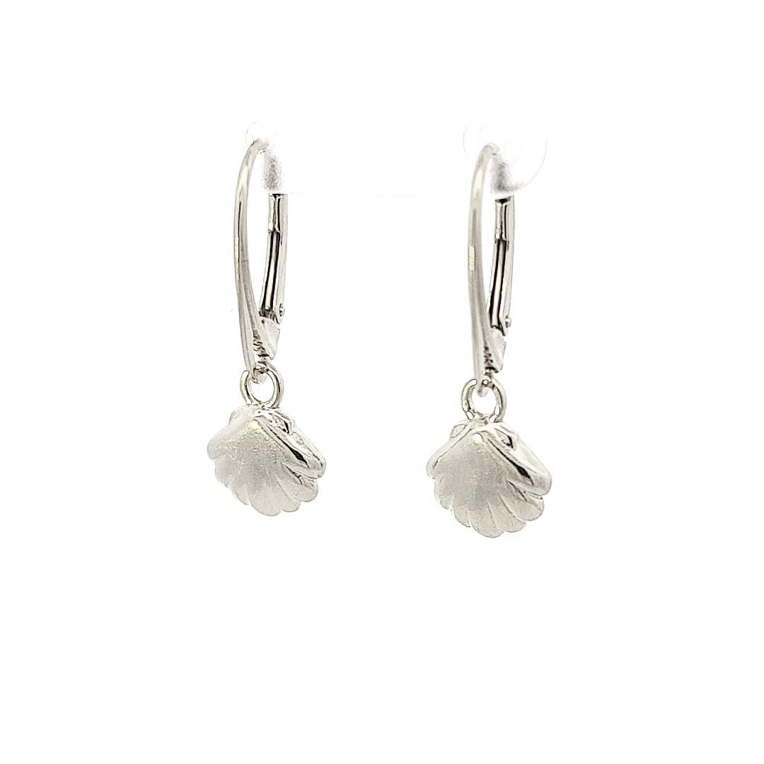 Close-up of sterling silver sea shell dangle & drop earrings with lever backs by Magpie Gems.