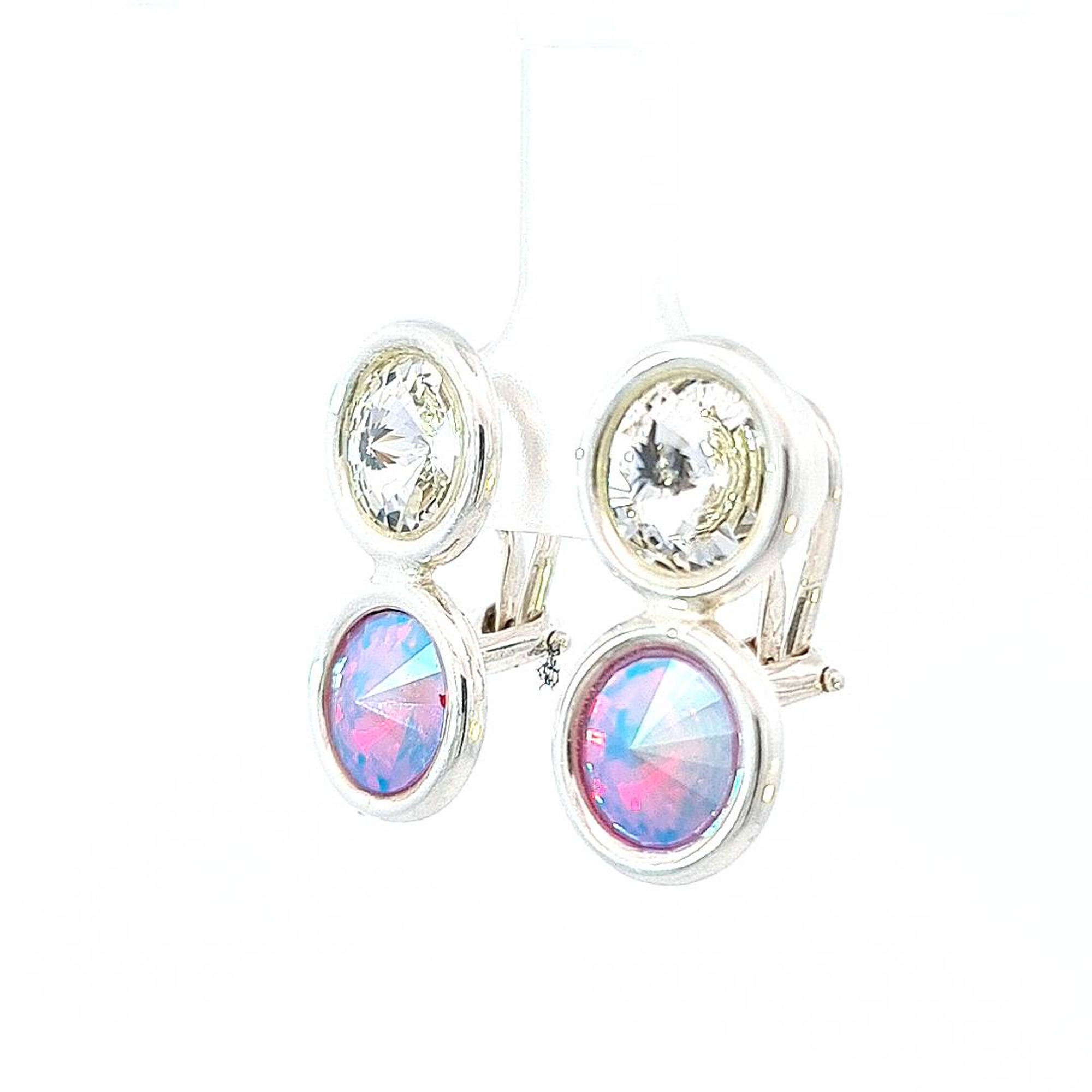 Alternate side view of Magpie Gems' sterling silver earrings with a glimpse of the clip-on mechanism and the depth of the coloured rivoli crystal.