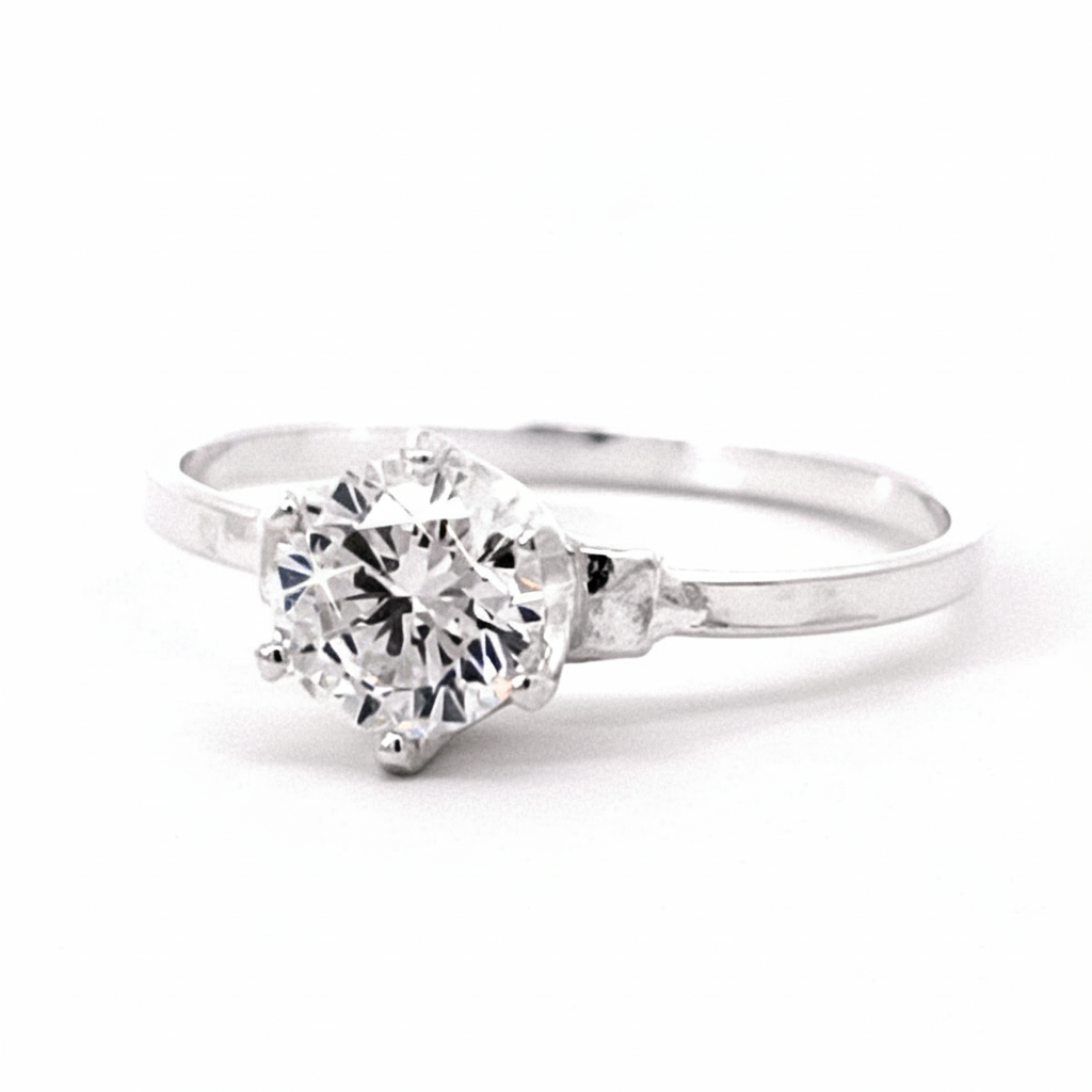 Close-up of bright sterling silver solitaire ring for women featuring a round cubic zirconia stone, hypoallergenic and nickel-free.