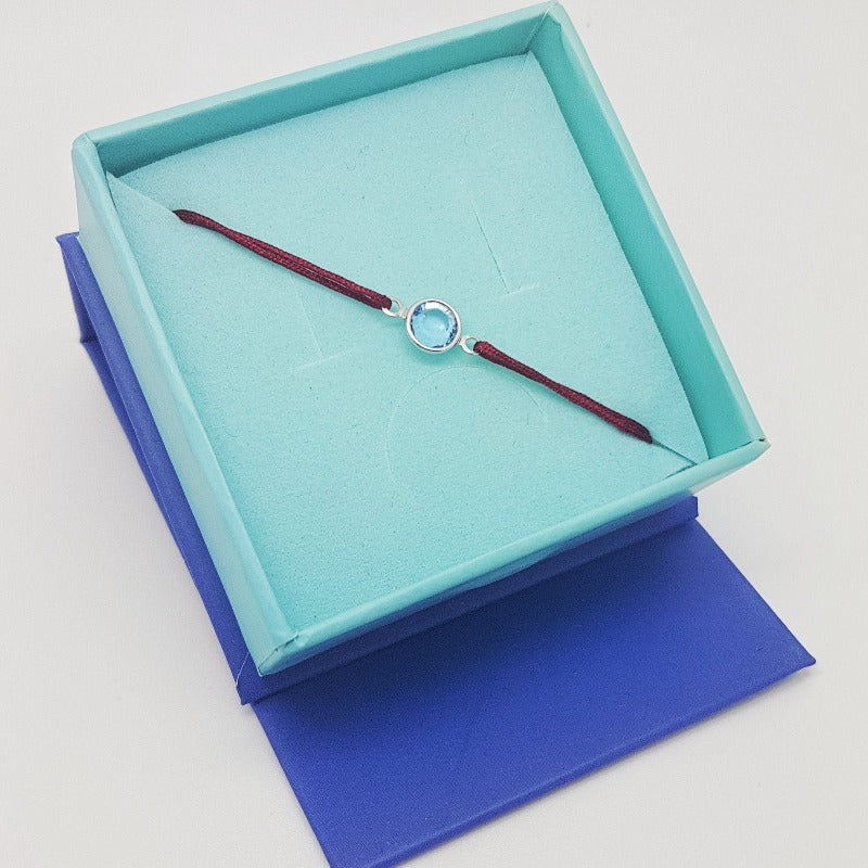Aquamarine March Birthstone crystal adjustable knot bracelet in red, Shop in Ireland, Gift Boxed