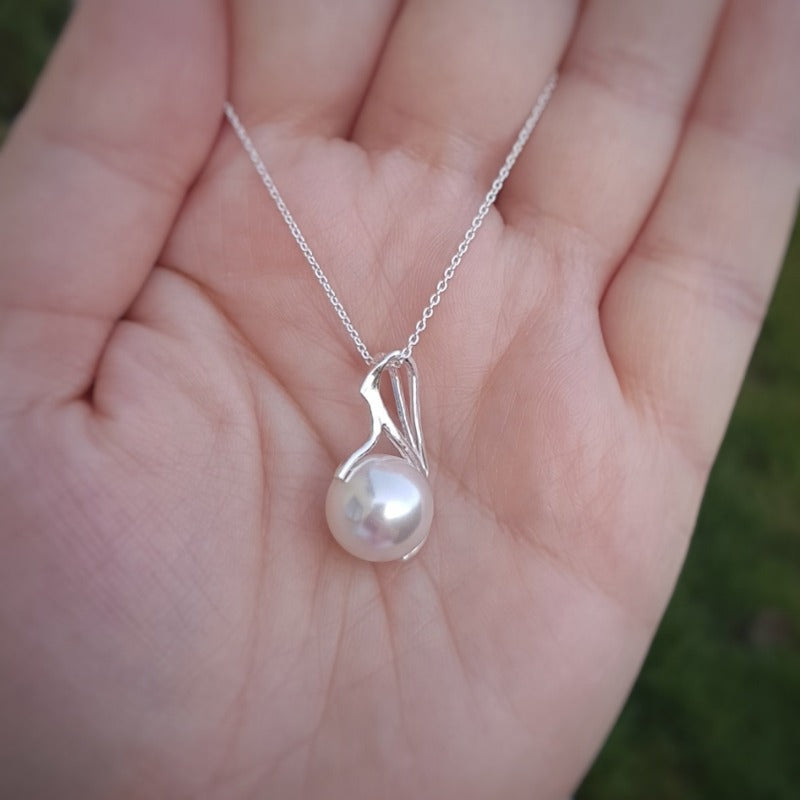 White pearl pendant with a Sterling silver chain necklace in a gift box from Ireland