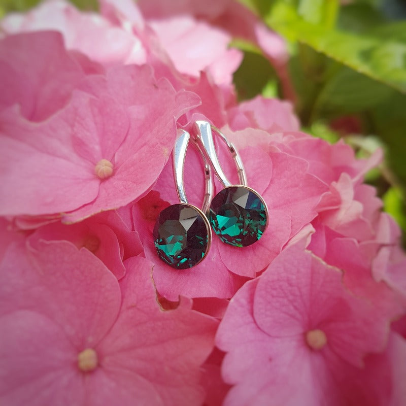 Emerald green round crystal earrings in silver for ladies by magpie gems ireland