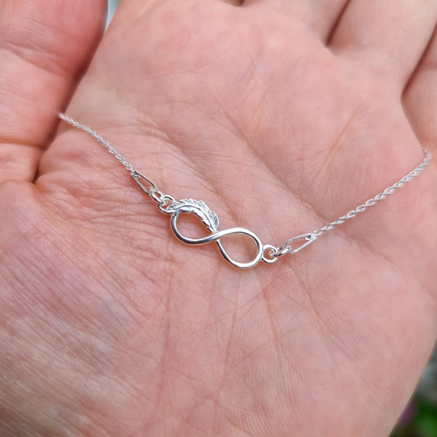 Fine sterling silver necklace with infinity feather pendant, shop in Ireland