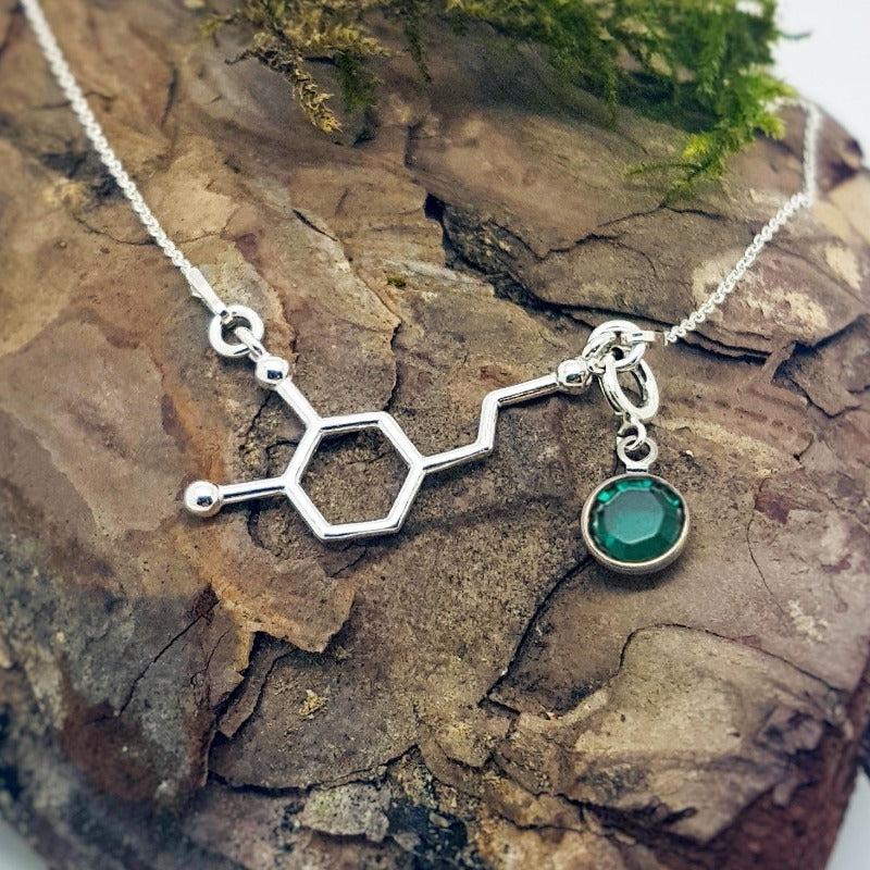 Science-inspired Jewelry: A unique necklace that celebrates the wonders of chemistry and the human brain.