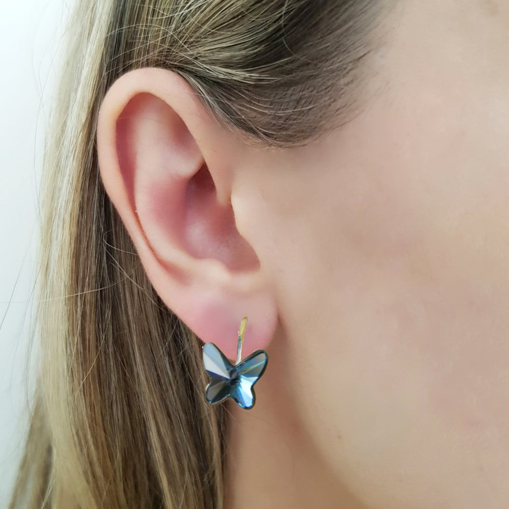 Elegant butterfly design, sparkling Austrian crystalstones, nickel-free sterling silver earrings. Perfect for sensitive ears. Gift box included.Colour denim blue