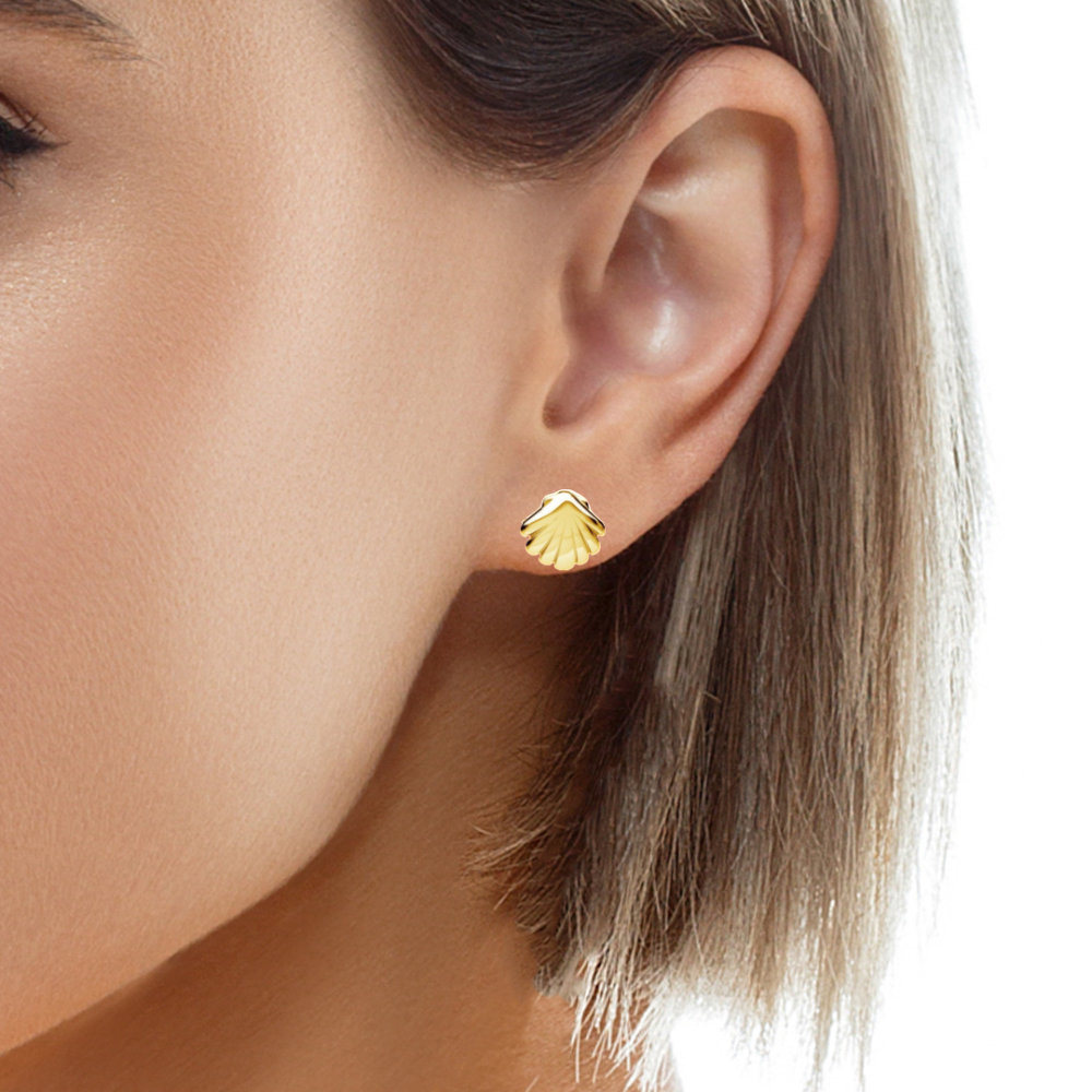 Women wearing a pair of Shell Stud earrings Gold plated over sterling silver 925, made in Ireland.