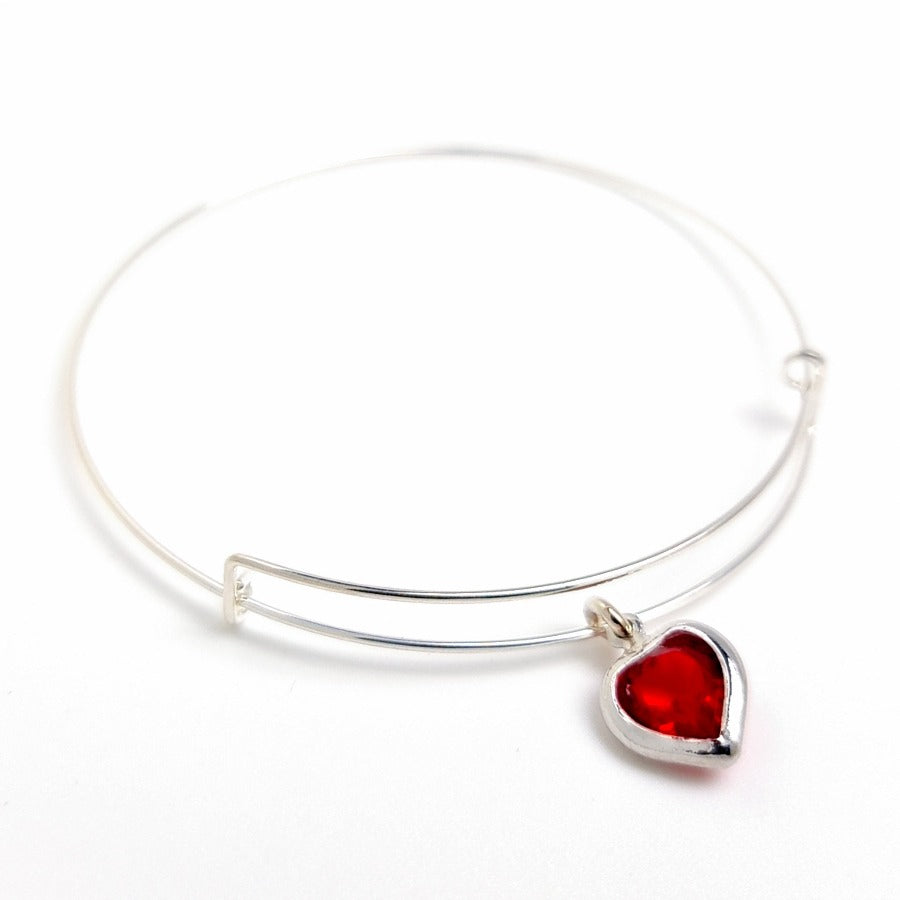 Charm bracelet with a red birthstone heart, [product type], - Personalised Silver Jewellery Ireland by Magpie Gems