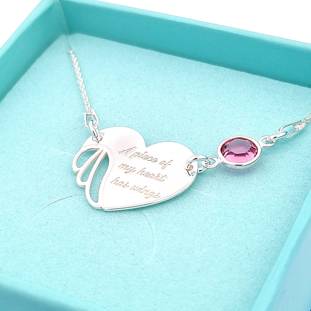 Sterling silver Winged Heart Necklace with custom birthstone crystal, angel wing pendant, and touching engraving on a fine chain – Magpie Gems. Shop Local Ireland - Ireland
