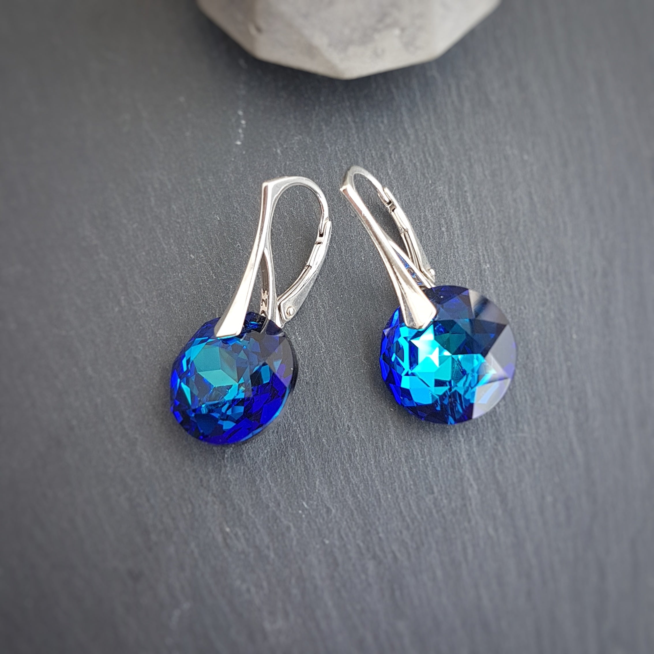 A pair of stylish Bermuda Blue Chaton Crystal Earrings with Sterling Silver 925 leverbacks, handmade for women in Ireland by Magpie Gems Jewellery.