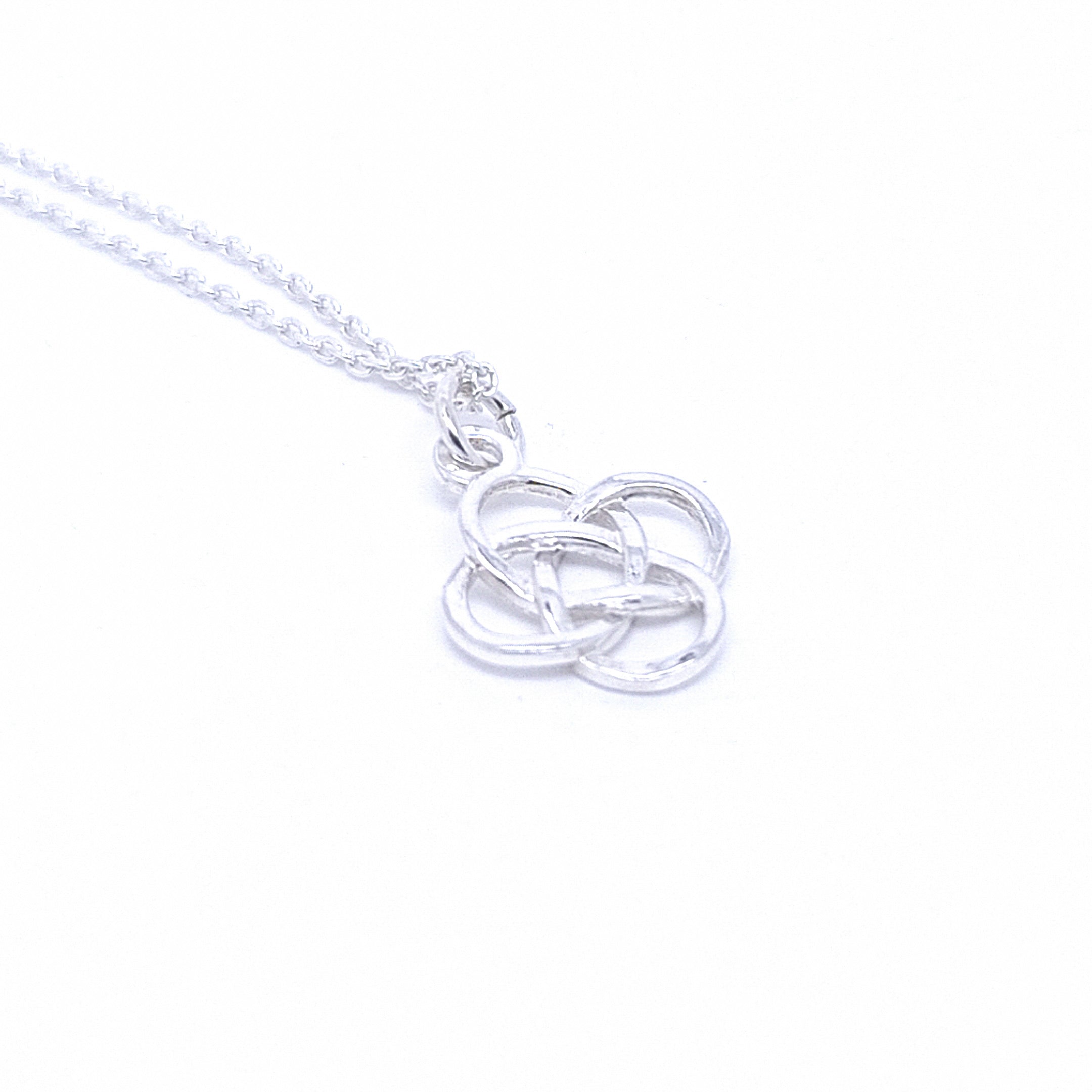Intricate Love Knot Silver Pendant on a 45cm Sterling Silver Chain by Magpie Gems.