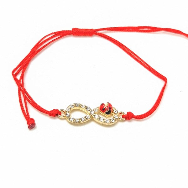 Gold Infinity with crystals and ladybird, red macramé cord string bracelet with infinity