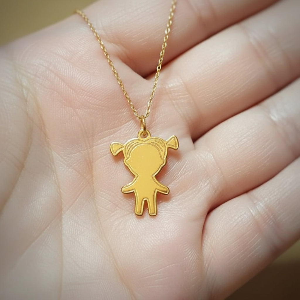 24k gold plated sterling silver necklace with a pendant of a little girl silhouette, showcased on a human hand to emphasize size and elegance, a Personalised Silver Jewellery Ireland by Magpie Gems