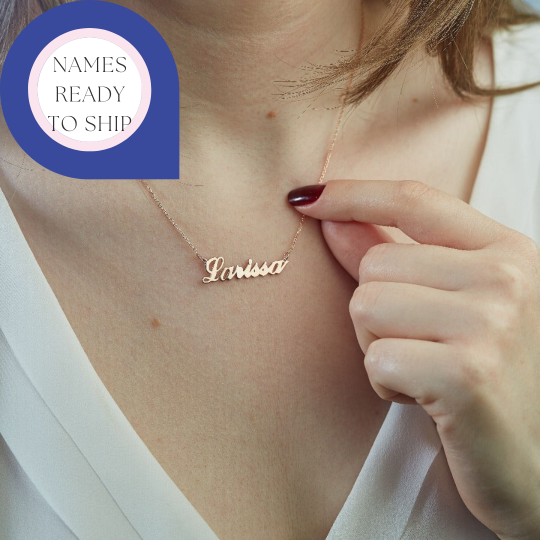 Blonde lady wearing a nickel-free sterling silver rosegold name necklace made in Ireland. The necklace sits elegantly on her collarbone and is ready to ship, perfect for any occasion