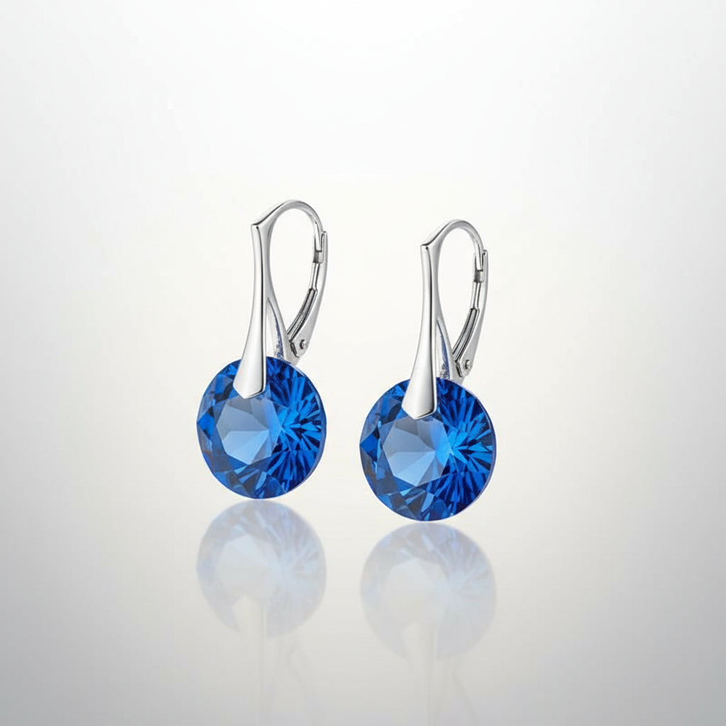 Sterling silver Sapphire blue 14mm Austrian crystal leverback earrings for September Virgo birthstone by Magpie Gems.