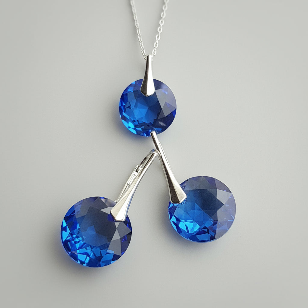 Sapphire blue September Virgo birthstone earrings and pendant necklace by Magpie Gems.