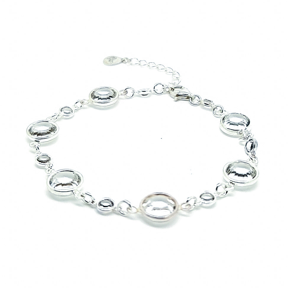 Chic April birthstone sterling silver bracelet, showcasing the brilliance of clear crystal diamonds, embodying purity and strength, handmade in Ireland.