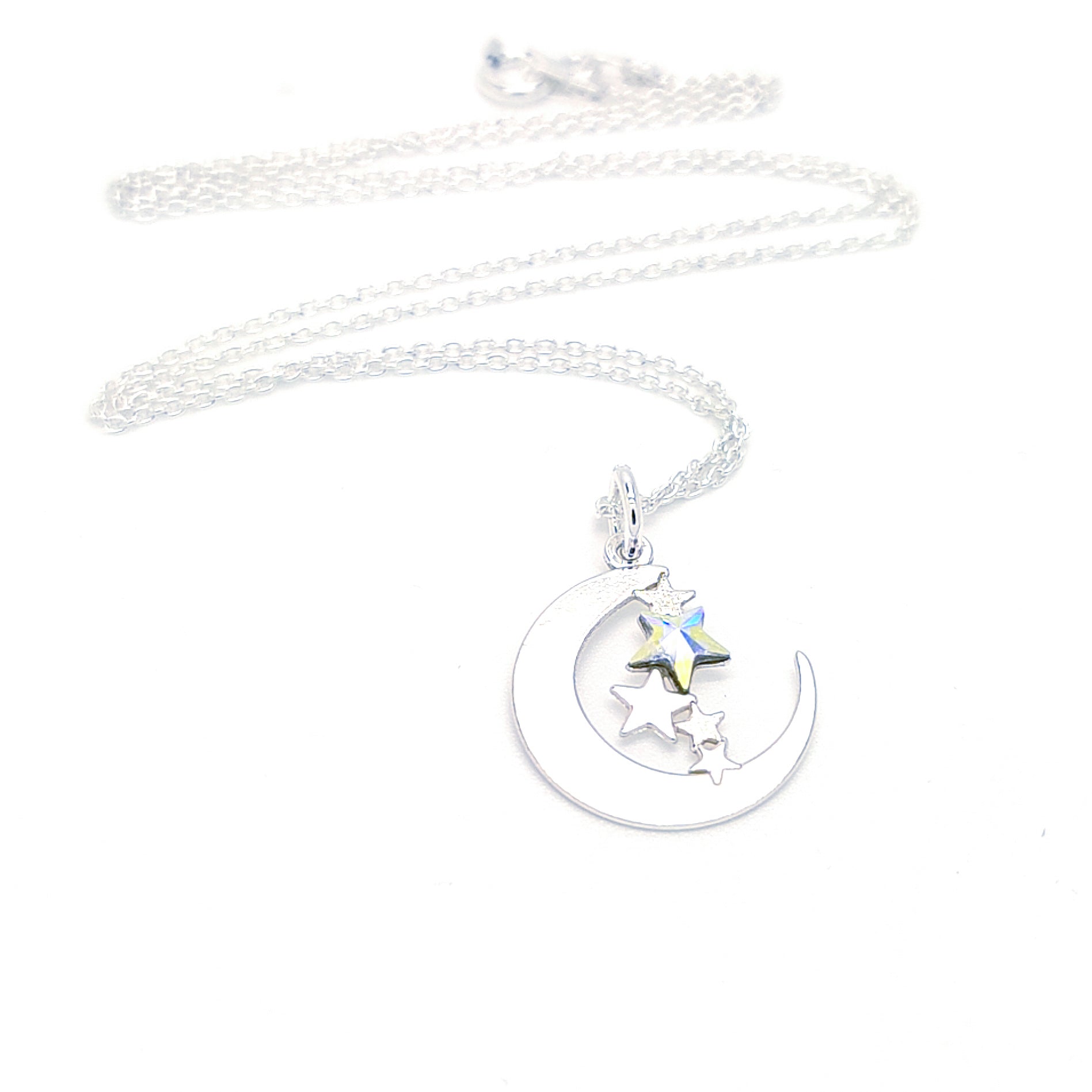 Sterling silver necklace with crescent moon and stars pendant on fine chain made in Ireland