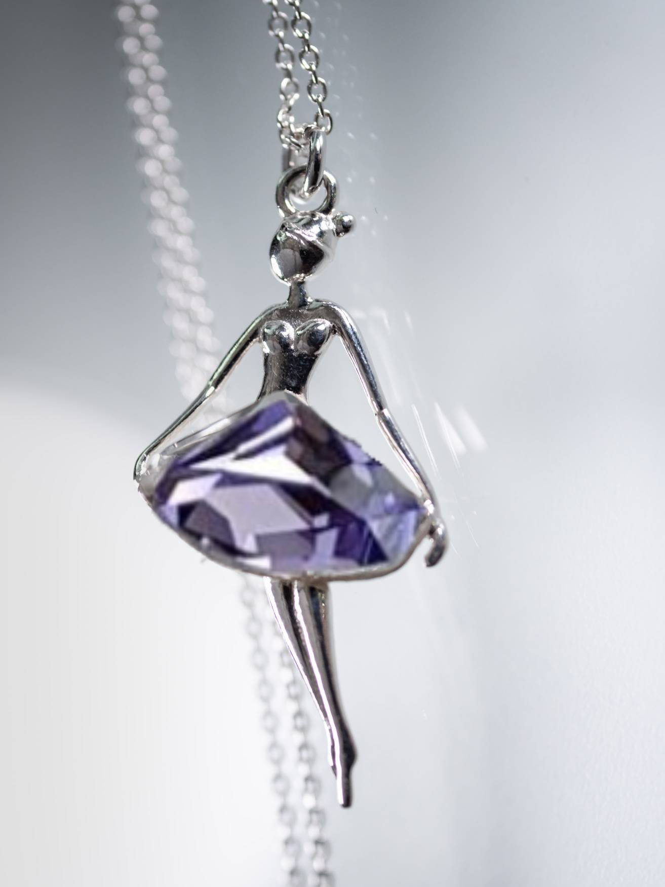 Captivating tanzanite purple crystal ballerina necklace crafted in sterling silver from Magpie Gems in Ireland.