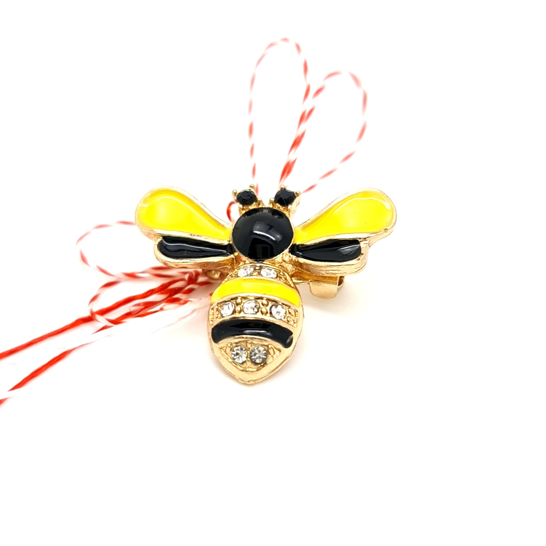 Enamel Bumblebee Martisor Brooch in Yellow with Gold Plating and Crystal Details, Tied with Red and White Martisor String.
